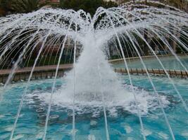 a fountain in a park photo