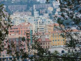 a view of a city from a hillside photo