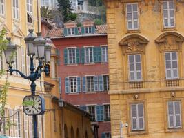 a tall building with a clock on it photo
