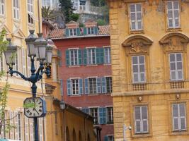 a tall building with a clock on it photo