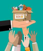 Cardboard donation box full of toys, books, clothes and devices. Help for children, support for poor kid. Donate container in hand. Social care, volunteering, charity concept. Flat vector illustration