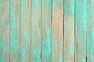 Vintage beach wood background - Old weathered wooden plank painted in turquoise blue pastel color. photo