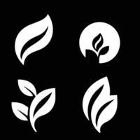 Leaves logo vector set isolated on Black background. Various shapes of green leaves of trees and plants. Elements for eco and bio logos.