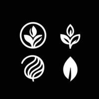 Leaves logo vector set isolated on Black background. Various shapes of green leaves of trees and plants. Elements for eco and bio logos.