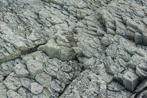 natural fondo, rock textura desde resistido de columna basalto foto
