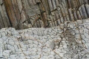 natural rock background, volcanic columnar jointed basalt photo