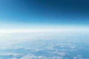 ai generado aéreo ver a el azul la tierra superficie con atmosférico calina y nubes foto