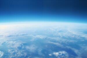 AI generated view from the space to the blue earth's surface with atmospheric haze and clouds photo