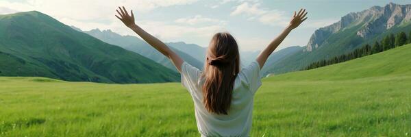 AI generated back view of woman standing on a hill with her hands up in the air photo