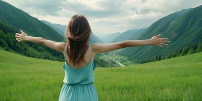 AI generated back view of woman standing on a hill with her hands up in the air photo