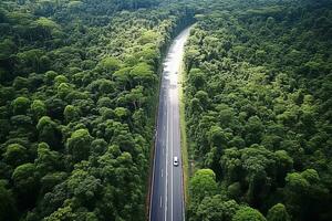 AI generated Aerial view of a road in the middle of the forest photo