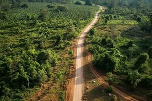 ai generado aéreo ver de un la carretera en el medio de el bosque , la carretera curva construcción arriba a montaña foto