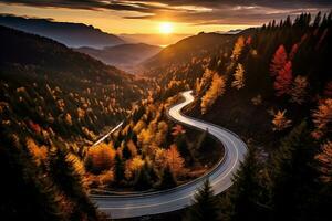 ai generado aéreo ver de montaña la carretera en bosque a puesta de sol en otoño. parte superior ver desde zumbido de la carretera en bosque. hermosa paisaje con calzada en sierras, pino árboles, verde prados foto