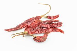 Dried red chili on white background. Clipping path included. photo