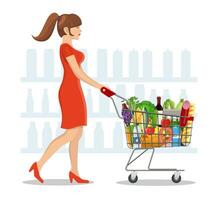 Young woman pushing supermarket shopping cart full of groceries. Vector illustration in flat style
