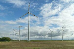 Wind Turbines in Cloudy Day in Germany photo