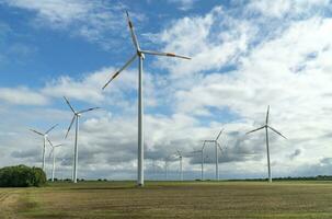 Wind Turbines in Cloudy Day in Germany photo