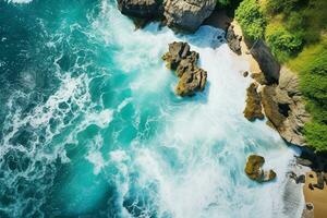 ai generado aéreo ver de camino, rocoso mar costa con olas y piedras a puesta de sol paisaje con hermosa camino, transparente azul agua, rocas parte superior ver desde zumbido de autopista en verano foto