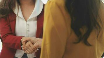 Real estate broker agent and customer shaking hands after signing contract documents for realty purchase, Bank employees congratulate, Concept mortgage loan approval. video