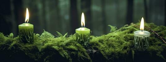 AI generated Burning candles on moss, dark green blurred the natural background. Magic candle. Generative AI photo