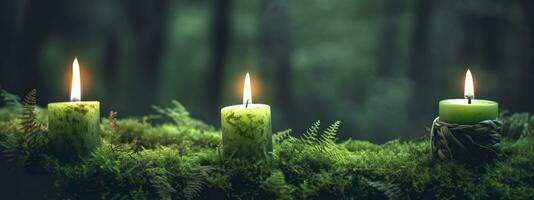 AI generated Burning candles on moss, dark green blurred the natural background. Magic candle. Generative AI photo