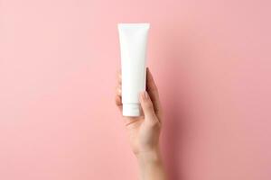 AI generated White empty facewash bottle in women hand photo