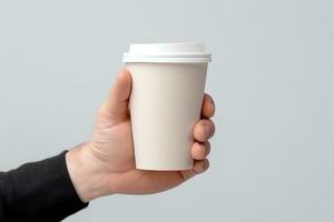 AI generated man holding empty blank coffee cup mockup photo