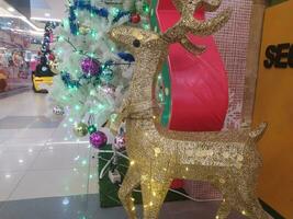 deer statue for Christmas tree decoration photo