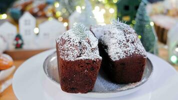 Christmas bread on the Christmas table. Chives sprinkled with sweet white powder are found on the table. video