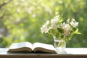 AI generated Jasmine flowers in a vase and open book on the table, green natural background. AI Generated photo