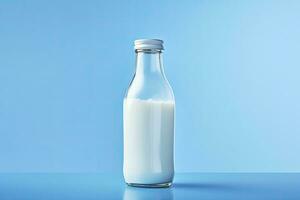 AI generated A glass bottle with full milk on blue background. AI Generated photo