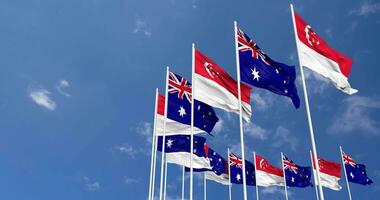 Australia y Singapur banderas ondulación juntos en el cielo, sin costura lazo en viento, espacio en izquierda lado para diseño o información, 3d representación video