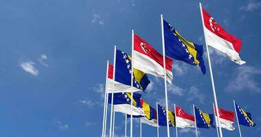 Bosnia and Herzegovina and Singapore Flags Waving Together in the Sky, Seamless Loop in Wind, Space on Left Side for Design or Information, 3D Rendering video