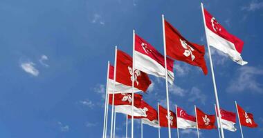hong Kong en Singapore vlaggen golvend samen in de lucht, naadloos lus in wind, ruimte Aan links kant voor ontwerp of informatie, 3d renderen video