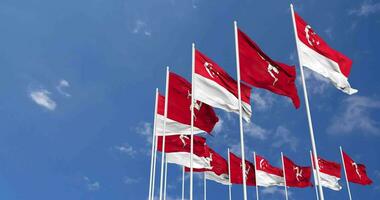 Isle of Man and Singapore Flags Waving Together in the Sky, Seamless Loop in Wind, Space on Left Side for Design or Information, 3D Rendering video