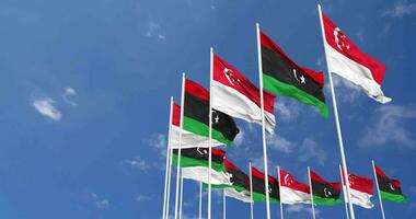 Libya and Singapore Flags Waving Together in the Sky, Seamless Loop in Wind, Space on Left Side for Design or Information, 3D Rendering video