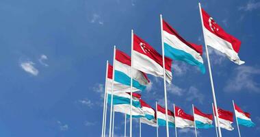 Luxembourg and Singapore Flags Waving Together in the Sky, Seamless Loop in Wind, Space on Left Side for Design or Information, 3D Rendering video