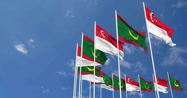 Mauritania and Singapore Flags Waving Together in the Sky, Seamless Loop in Wind, Space on Left Side for Design or Information, 3D Rendering video