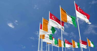 Ivory Coast and Singapore Flags Waving Together in the Sky, Seamless Loop in Wind, Space on Left Side for Design or Information, 3D Rendering video