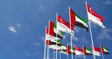 United Arab Emirates and Singapore Flags Waving Together in the Sky, Seamless Loop in Wind, Space on Left Side for Design or Information, 3D Rendering video