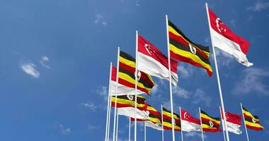 Uganda and Singapore Flags Waving Together in the Sky, Seamless Loop in Wind, Space on Left Side for Design or Information, 3D Rendering video