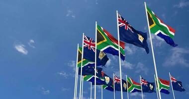 Anguilla and South Africa Flags Waving Together in the Sky, Seamless Loop in Wind, Space on Left Side for Design or Information, 3D Rendering video