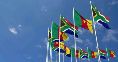 Cameroon and South Africa Flags Waving Together in the Sky, Seamless Loop in Wind, Space on Left Side for Design or Information, 3D Rendering video