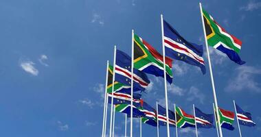 Cape Verde, Cabo Verde and South Africa Flags Waving Together in the Sky, Seamless Loop in Wind, Space on Left Side for Design or Information, 3D Rendering video