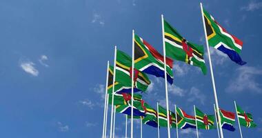 dominica e sul África bandeiras acenando juntos dentro a céu, desatado ciclo dentro vento, espaço em esquerda lado para Projeto ou Informação, 3d Renderização video