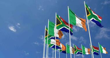 Ireland and South Africa Flags Waving Together in the Sky, Seamless Loop in Wind, Space on Left Side for Design or Information, 3D Rendering video