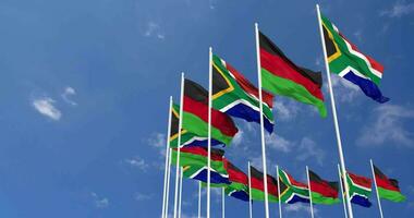 Malawi and South Africa Flags Waving Together in the Sky, Seamless Loop in Wind, Space on Left Side for Design or Information, 3D Rendering video