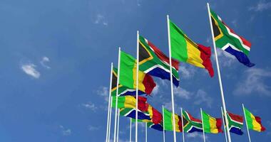 Mali and South Africa Flags Waving Together in the Sky, Seamless Loop in Wind, Space on Left Side for Design or Information, 3D Rendering video