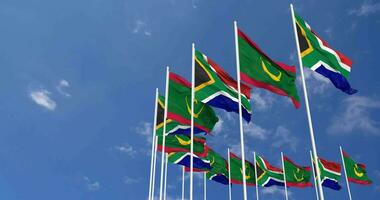 Mauritania and South Africa Flags Waving Together in the Sky, Seamless Loop in Wind, Space on Left Side for Design or Information, 3D Rendering video