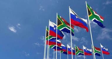 Slovenia and South Africa Flags Waving Together in the Sky, Seamless Loop in Wind, Space on Left Side for Design or Information, 3D Rendering video